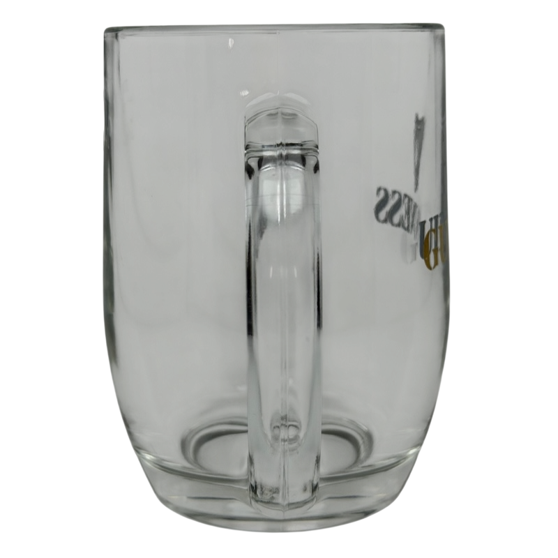 Clear glass mug featuring the Guinness Harp logo, ideal for enjoying your favorite beverages