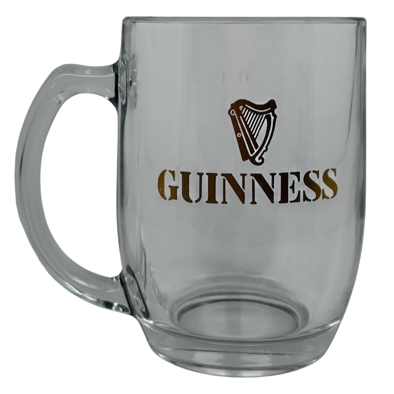 Guinness Harp Logo Glass Mug with clear design and sturdy handle for beer enthusiasts