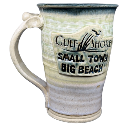 Gulf Shores sea turtle pottery mug with a 'Small Town Big Beach' design and textured handle