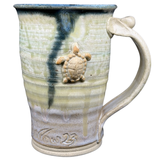 Gulf Shores sea turtle pottery mug with textured design and turtle accent for unique coastal charm