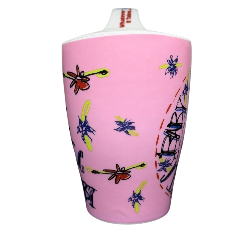 Gwen Stefani collectible mug in pink with colorful floral designs, ideal for fans and collectors