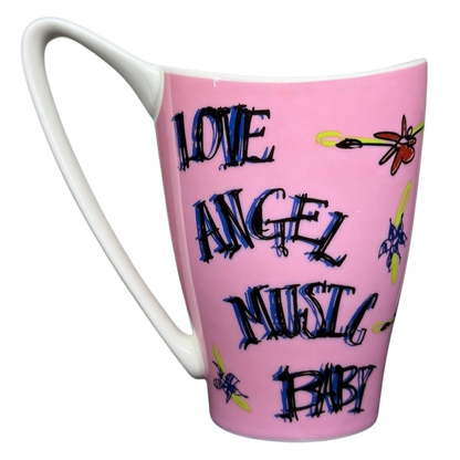 Gwen Stefani collectible mug in pink with artistic text 'Love Angel Music Baby'