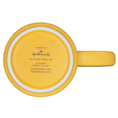 Yellow Hallmark Disney mug bottom showing Hallmark logo and dishwasher microwave safe text on Animal Muppets vintage coffee mug