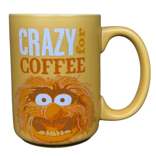 Yellow Hallmark Walt Disney Animal Muppets vintage coffee mug with Crazy for Coffee text and Animal face illustration