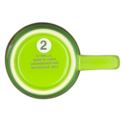 Bottom view of Hallmark Christmas Peace On Earth mug showing dishwasher and microwave safe label