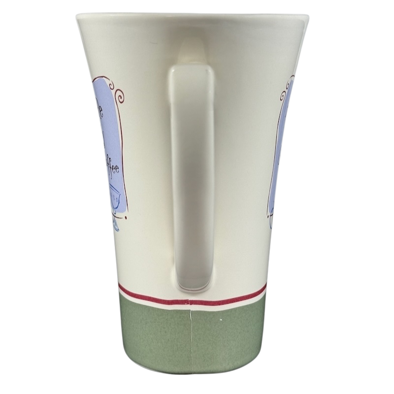 Hallmark collectible Snow White Disney mug with white body and green base shown from the back handle view