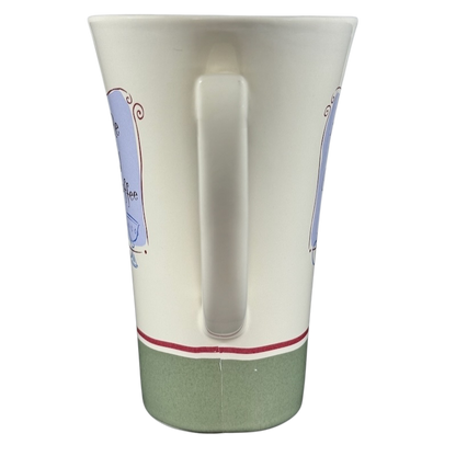 Hallmark collectible Snow White Disney mug with white body and green base shown from the back handle view