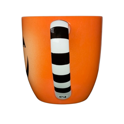 Hallmark Halloween Jack-O'-Lantern vintage mug in orange with a striped handle for festive drinks