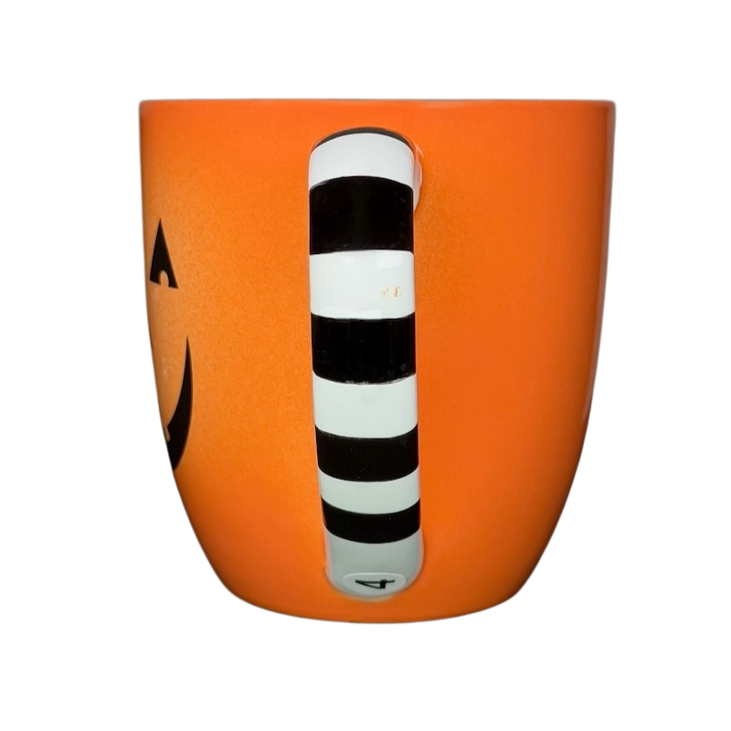 Hallmark Halloween Jack-O'-Lantern vintage mug with a black and white striped handle