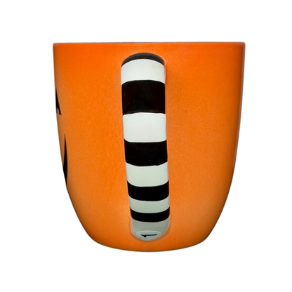 Hallmark Halloween Jack-O'-Lantern vintage mug with striped handle in vibrant orange color
