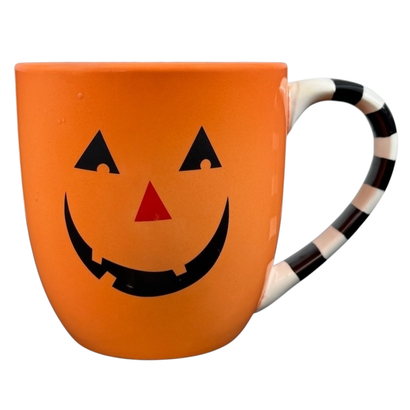 Hallmark Halloween Jack-O'-Lantern vintage mug in orange with a smiling face and striped handle
