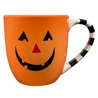 Hallmark Halloween Jack-O'-Lantern vintage mug in orange with a smiling face and striped handle