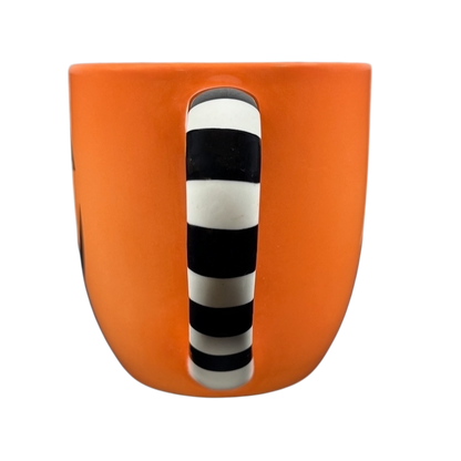 Hallmark Halloween Jack-O'-Lantern vintage mug with a striped handle design in vibrant orange