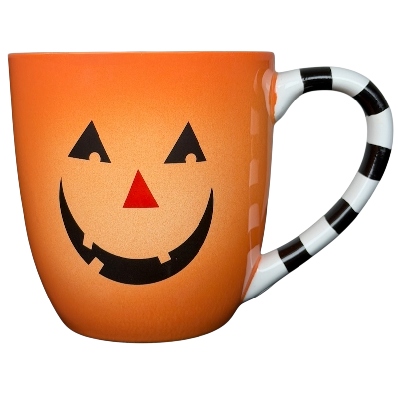 Hallmark Halloween Jack-O'-Lantern vintage mug with a smiling face and striped handle