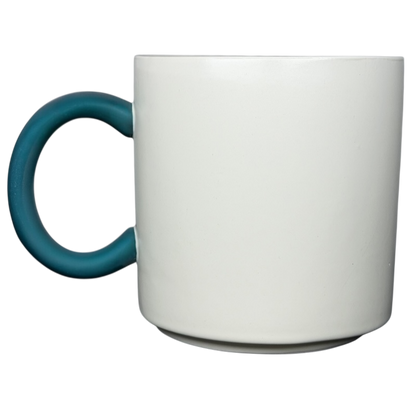 Peanuts Movie Relaxation Mug Hallmark with a teal handle and a minimalist design for cozy drinks