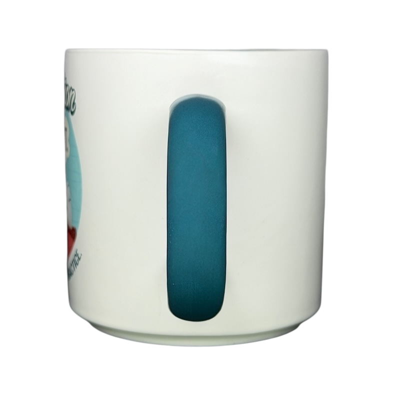 Peanuts Movie Relaxation Mug Hallmark featuring a colorful design and a teal handle for cozy moments