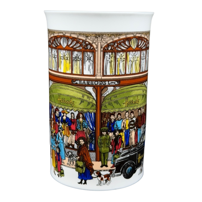 Harrods Knightsbridge London Storefront Scene Mug featuring colorful crowd and store details