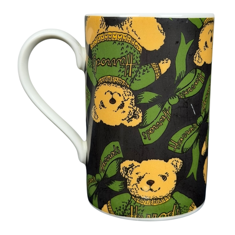 Harrods Knightsbridge Teddy Bear Green Sweater Mug featuring a playful teddy bear design