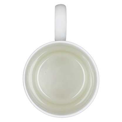 Top view of the Harrods Knightsbridge Teddy Bear Green Sweater Mug with a smooth white interior