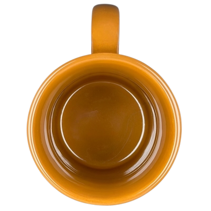 A top view of a yellow Hawaiian Islands Mug Island Heritage with a smooth interior