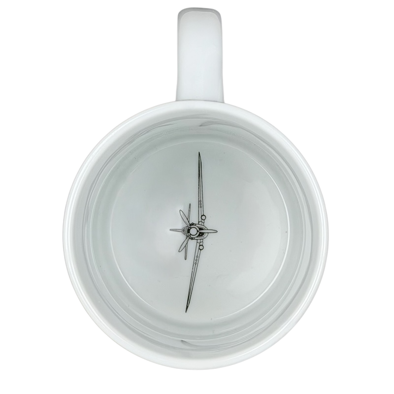 Top view of a white mug featuring a Curtiss Wright P-40 Warhawk design by Hawker Aerospace