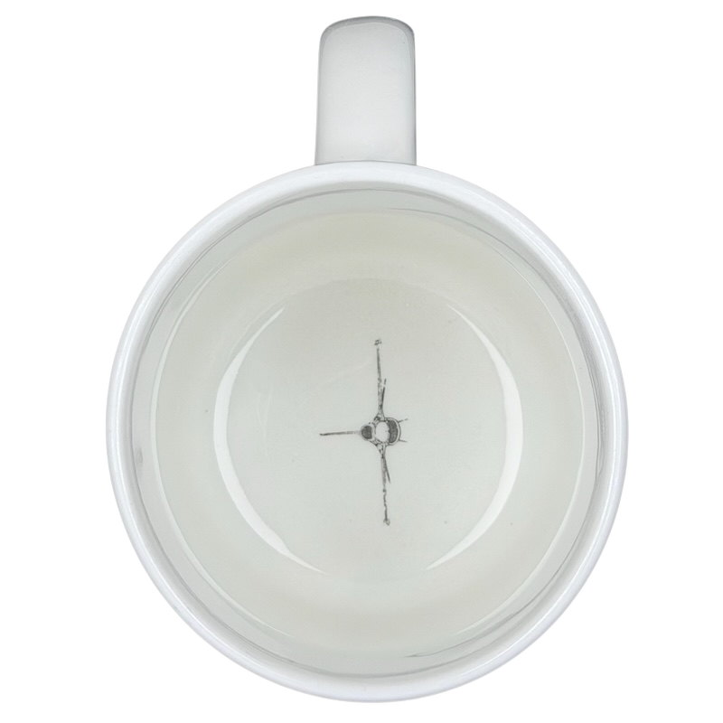 Inside view of a Hawker Aerospace mug featuring an F-16 Fighting Falcon design for aviation enthusiasts