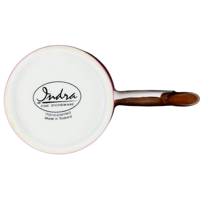 Bottom view of Heart Hug Girl Mug Indra showing the hand-painted logo and smooth ceramic finish