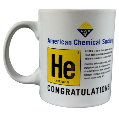 Helium anniversary mug collectible featuring the element symbol He and congratulations text