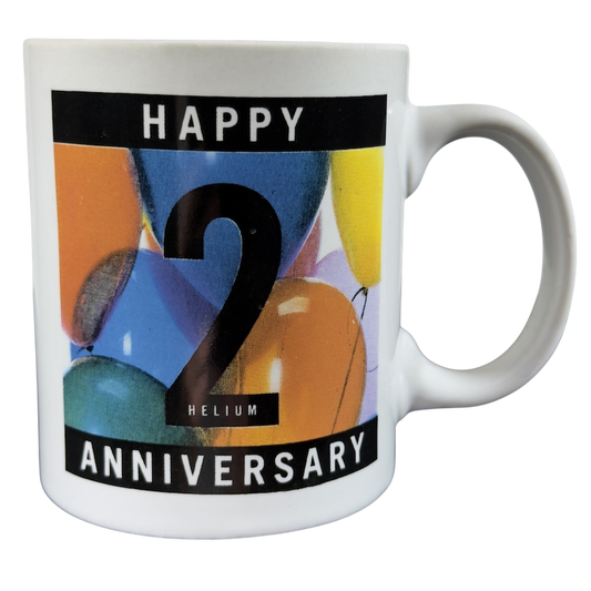 Happy Helium Anniversary Mug Collectible featuring colorful balloons and a bold '2'