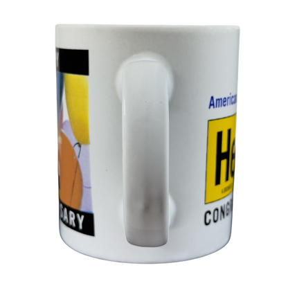 Helium anniversary mug collectible featuring colorful balloon designs for celebration occasions