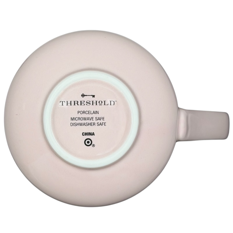 Bottom view of a Threshold hello lovely swan mug in soft pink porcelain, microwave and dishwasher safe
