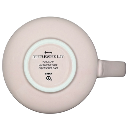 Bottom view of a Threshold hello lovely swan mug in soft pink porcelain, microwave and dishwasher safe