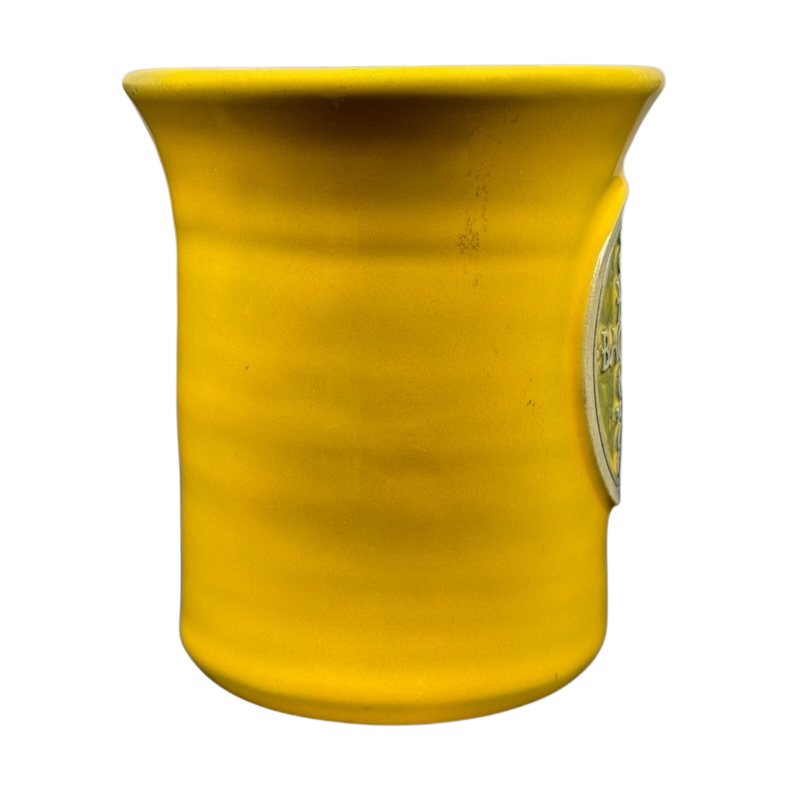 Hell's Backbone Deneen Pottery yellow mug 2014 featuring a vibrant yellow glaze and cylindrical shape
