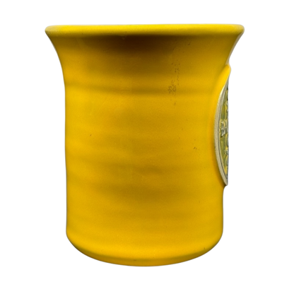 Hell's Backbone Deneen Pottery yellow mug 2014 featuring a vibrant yellow glaze and cylindrical shape
