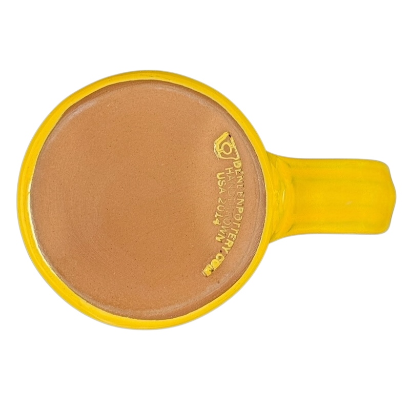 Bottom view of Hell's Backbone Deneen Pottery yellow mug 2014 showcasing the brand's signature and craftsmanship