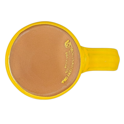 Bottom view of Hell's Backbone Deneen Pottery yellow mug 2014 showcasing the brand's signature and craftsmanship