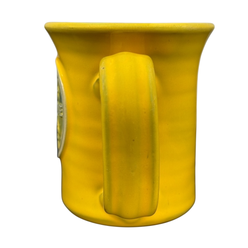 Hell's Backbone Deneen Pottery yellow mug 2014 featuring a unique design and comfortable handle