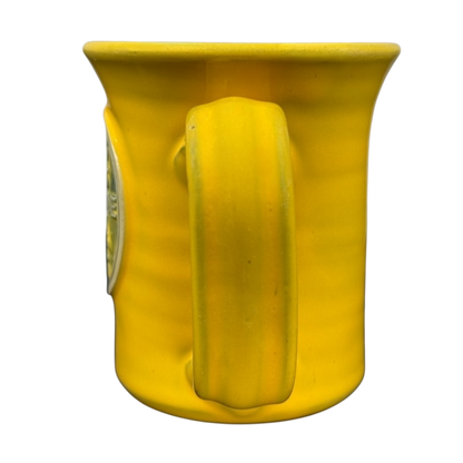 Hell's Backbone Deneen Pottery yellow mug 2014 featuring a unique design and comfortable handle