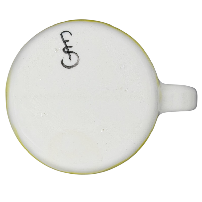 Bottom of a hidden frog vintage pottery mug showcasing its unique design and artisan craftsmanship