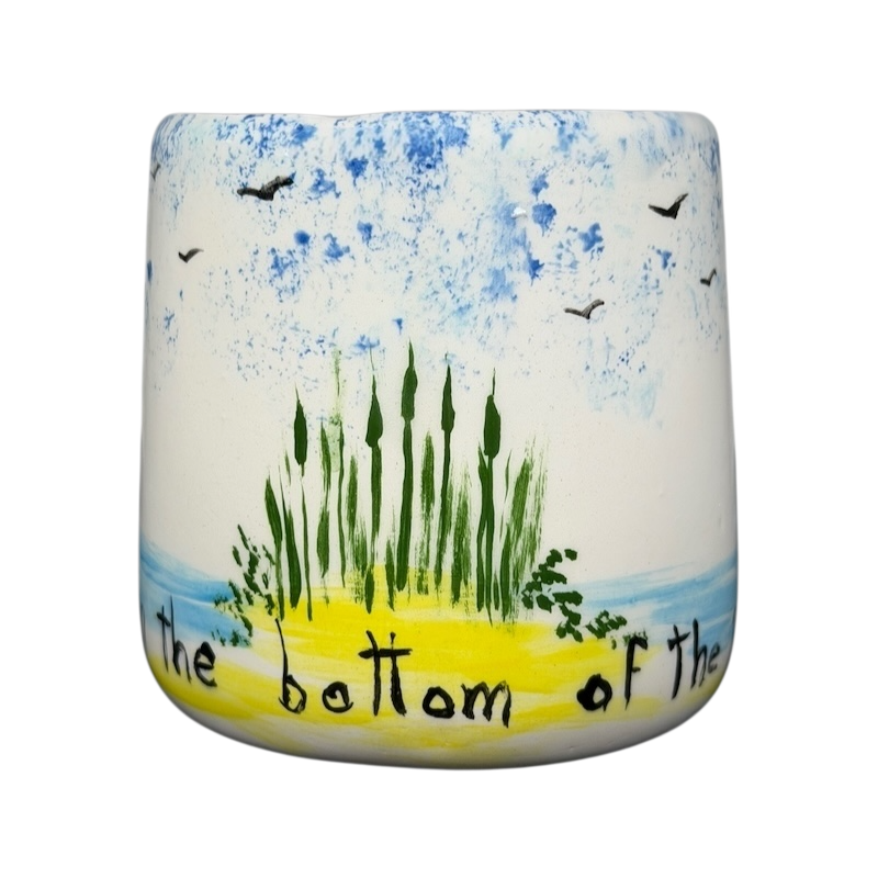 Hidden frog vintage pottery mug with hand-painted scenery of plants and birds against a blue sky