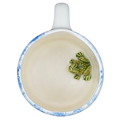 Hidden frog vintage pottery mug featuring a detailed frog design on the interior bottom
