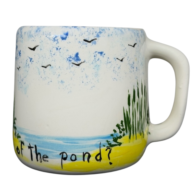 Hidden frog vintage pottery mug with nature scene depicting a pond and birds in the sky