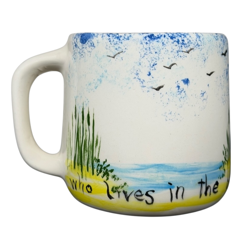 Hidden frog vintage pottery mug featuring a hand-painted landscape with birds and water design