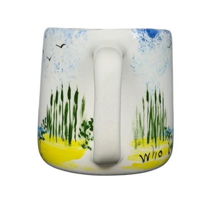 Hidden frog vintage pottery mug featuring nature-inspired designs and vibrant colors