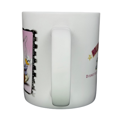 Hollywood Pictures Backlot Dueling Divas Mickey And Daisy Disney's California Adventure Mug featuring colorful character designs