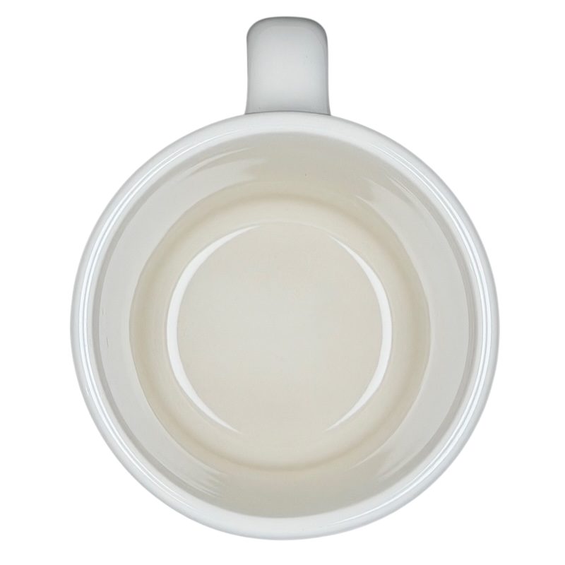 Inside view of a white Fouled Anchor US Navy Mug Homer Laughlin China with smooth ceramic finish