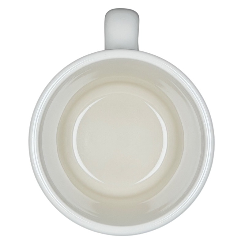 Inside view of a Fouled Anchor US Navy Mug Homer Laughlin China showing its smooth and plain interior.