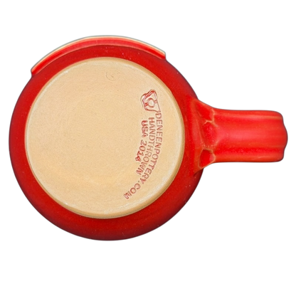 Bottom view of a Hotel Del Coronado Deneen vintage red mug showcasing the brand's logo and pottery details