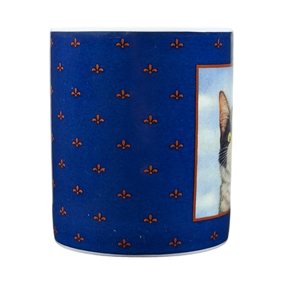 Hugo Hege cat Lang & Wise mug with a blue background and a cat photo on the side