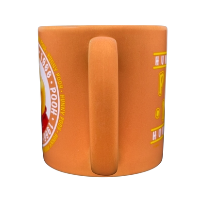Hunny Pooh 1966 collectible Disney mug featuring a vibrant design and sturdy handle